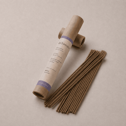 Lavender incense sticks named ‘lavender bliss’ packed in an incense kraft paper tube labeled 'inflowence' on a purple background