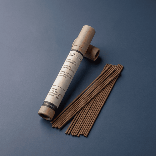 Lavender incense sticks named ‘deep dream’ packed in an incense kraft paper tube labeled 'inflowence' on a blue background