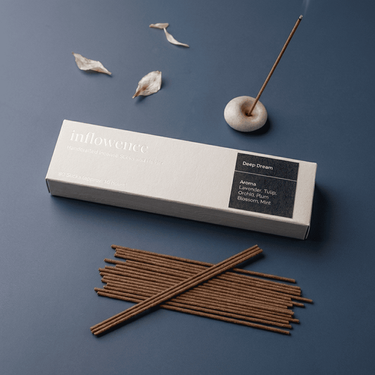 Lavender incense sticks named ‘deep dream’ packed in an incense  box labeled 'inflowence' on a dark blue background