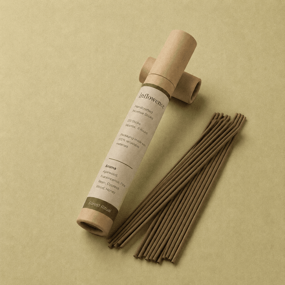 Frankincense incense sticks named ‘forest ritual’ packed in an incense kraft paper tube labeled 'inflowence' on a green background