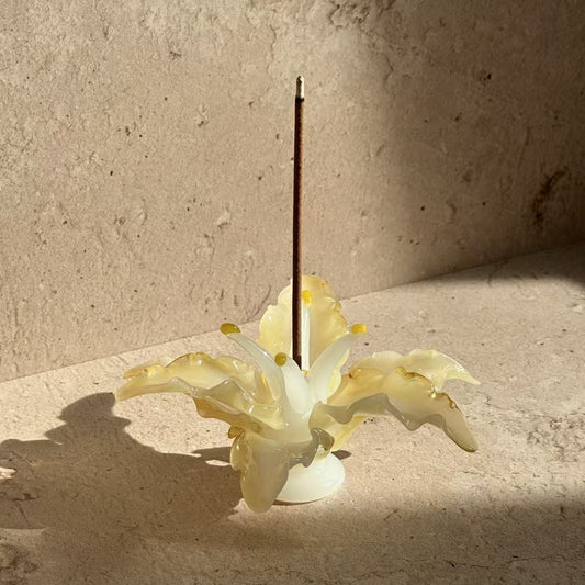 Handcrafted glass incense holder shaped like a blooming lily, designed to hold incense sticks for modern ritual and mindful living