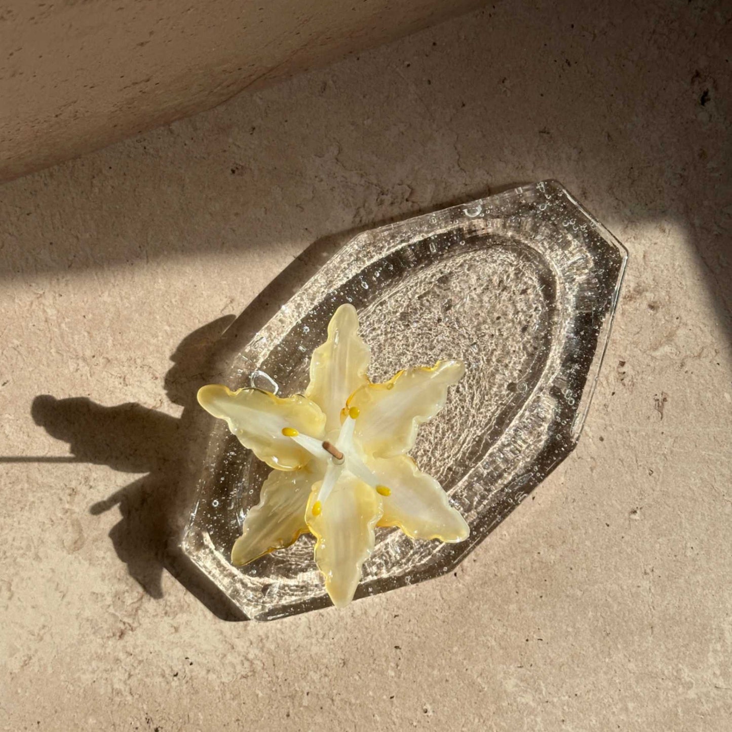 Handcrafted glass ash catcher designed to catch falling incense ash, featuring a sculptural floral form