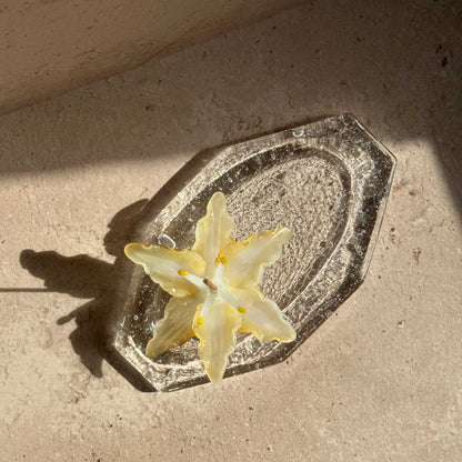 Handcrafted glass ash catcher designed to catch falling incense ash, featuring a sculptural floral form