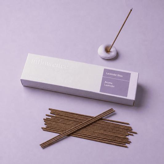 Lavender incense sticks named ‘lavender bliss’ packed in an incense box labeled 'inflowence' on a purple background