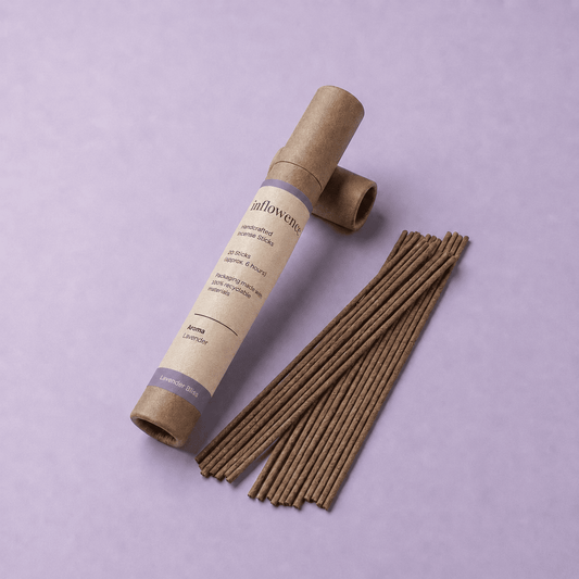 Lavender incense sticks named ‘lavender bliss’ packed in an incense kraft paper tube labeled 'inflowence' on a purple background