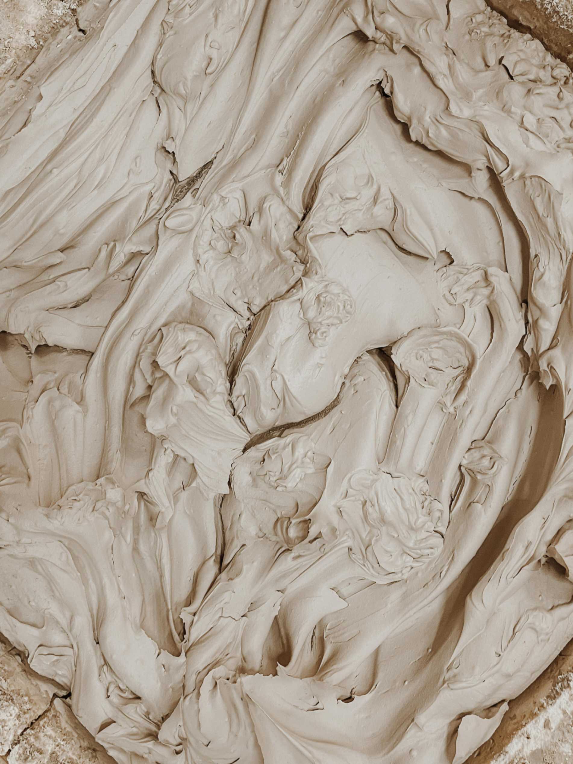 Close-up of natural fired clay material used in handcrafted ceramic incense holders, highlighting organic texture and subtle variations