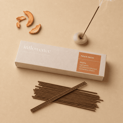 Flower incense sticks named ‘petal & Nectar’ packed in an incense box labeled 'inflowence' on a orange background