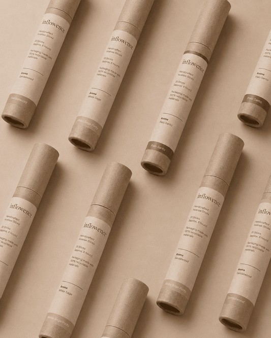 Three different incense named 'palo santo', 'white sage purity', 'sandalwood' labeled with 'inflowence' on the paper kraft tube in different color backgrounds.