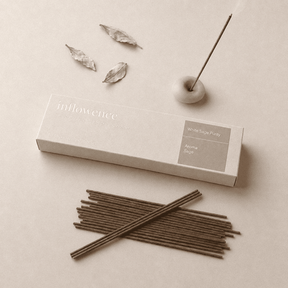 White sage incense sticks named ‘white sage purity’ packed in an incense box labeled 'inflowence' on a beige background