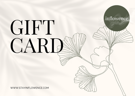 inflowence gift card with minimalist branding on a beige background, featuring soft leaf shadows and delicate line art.