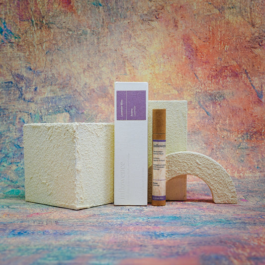 Lavender Bliss box and tube incense set displayed with a white textured block decoration, set against a Claude Monet–inspired canvas — a dreamy, floral scene evoking soft beauty and ritual calm.